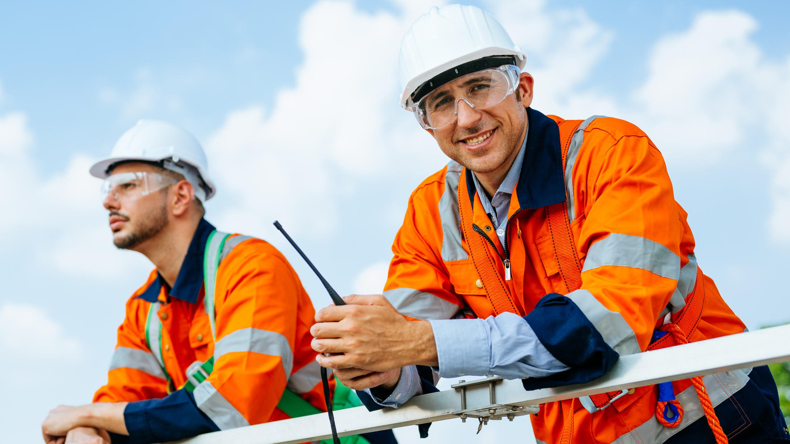 professional-engineers-technicians-working-wind-turbine-farm-field